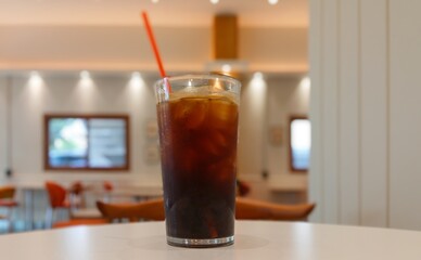 A cup of iced coffee on a table