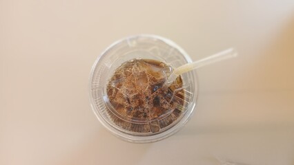 A cup of iced coffee on a table