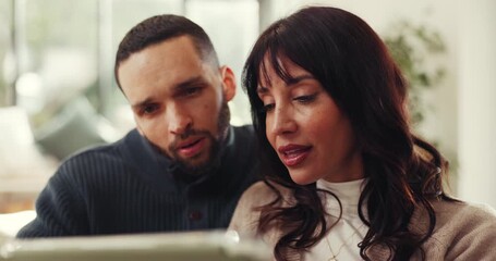 Couple, research and planning in home with tablet, loan and mortgage application. Serious, people and conversation in finance with budget, investment and money management in insurance decision. - Powered by Adobe