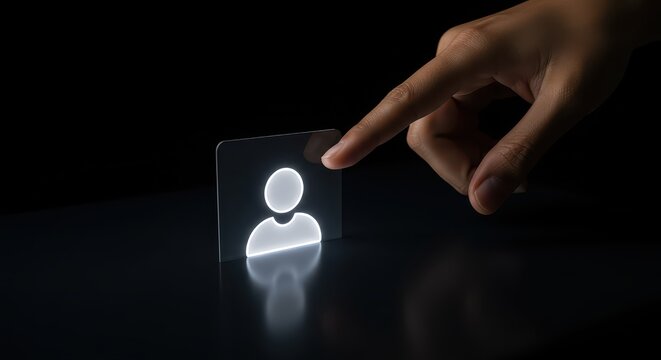 Clicking Connection: A human hand gently interacts with a digital profile icon, symbolizing identity, access, and online connection in a realm of technology and information.