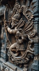 Intricate stone carving of a warrior archer demonstrating ancient craftsmanship from an Indian temple
