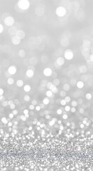 Sparkling Silver Glitter Bokeh Background with Soft Focus Lights.