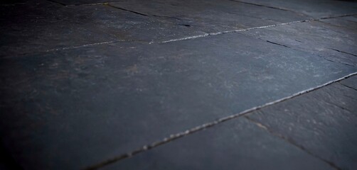 Elegant dark slate tiles provide a sophisticated, modern surface perfect for design projects and architectural backgrounds.