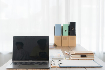 Home Office Desk with Laptop and File Folders