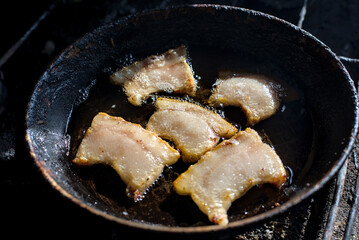 Photo of fried pork lard in a pan