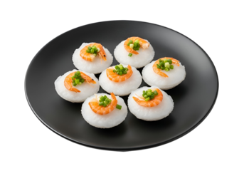 A plate of delicious, light-colored steamed rice cakes topped with shrimp and scallions.