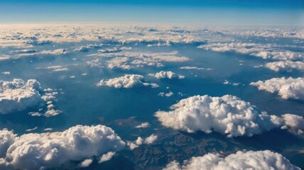 Clouds above ocean and mountains