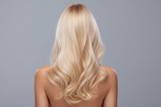 Beautiful long blonde hair flowing down the back against a soft gray background in a minimalist setting Generative AI