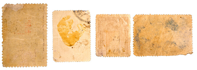 Four old blank postage stamps with transparent background