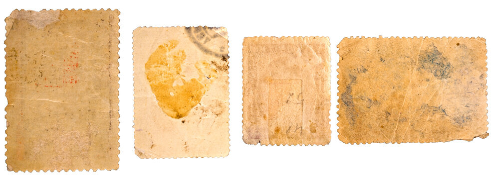 Four old blank postage stamps with transparent background