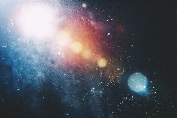 retro film light leak overlay effect with scratch dust and light leaks, retro grain noisy film distressed texture light leak flare on black background