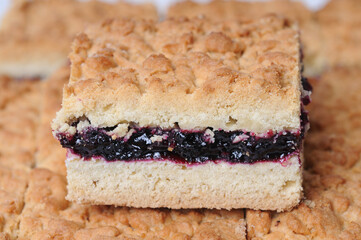 Cookies with blueberry jam on a white background close-up. Baking.