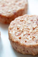 Three Plant-Based Meatballs on a White Plate