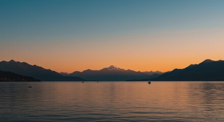 Fototapeta premium Sunset over mountain lake landscape