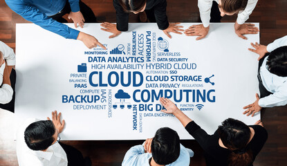 A diverse group of professionals engages in a strategic discussion about cloud computing, focusing on essential concepts such as data analytics and security measures. Amity