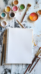 Vibrant Art Supplies and Painting Workspace with Brushes, Palette, and Canvas for Creative Inspiration