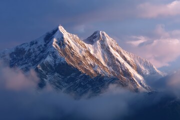 sunrise over misty mountains, golden light illuminating snowy peaks, clouds rolling in valleys