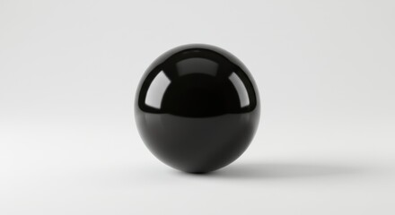 A glossy black sphere against a plain white background.