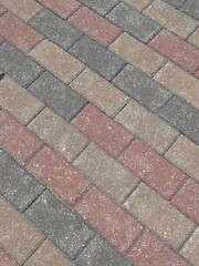 Pattern of red, gray, and tan brick pavers Bradenton Fl. 07/20/2925