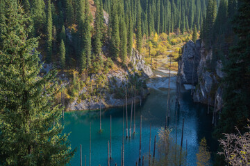 Beautiful mountain lakes with clear blue water, panorama of mountains on the background, wildlife spectacular view, hiking and hiking
