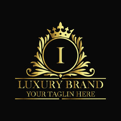 Luxury brand logo I design with golden crown and elegant royal monogram template for premium identity