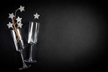 Two glasses with wooden tar decoraion with rope, flat lay, celebration concept