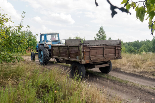 Tractor moving uphill on a one-way road.A driver suddenly turns the steering wheel to the right despite the fact that a road goes straight.Driver reaction speed as a key factor in avoiding an accident