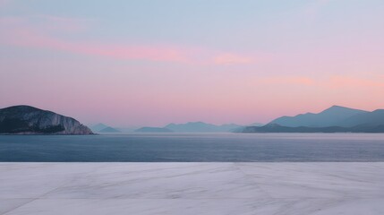 Serene Coastal Landscape: Marble Terrace Overlooking Misty Mountains at Dusk.