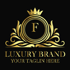 Luxury brand F logo design in golden royal style with elegant crown and premium emblem for businesses