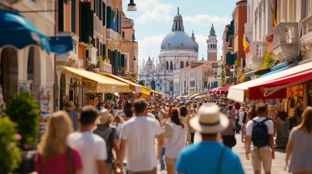 Large crowd of tourists walking through medieval street towards famous European cathedral, symbol of overtourism and crowded travel