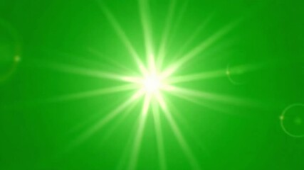 Bright radiant starburst illuminates a vibrant green background with subtle lens flares - Powered by Adobe