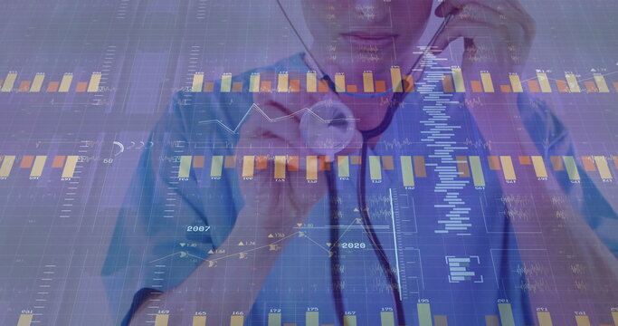 Pressing stethoscope against chest, male healthcare professional in digital interface, data charts