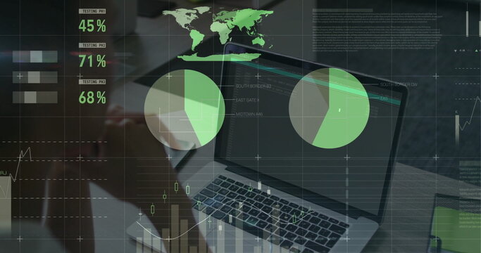 Laptop displaying green data visuals at office desk, with notebook pen coffee cup smartphone - Powered by Adobe