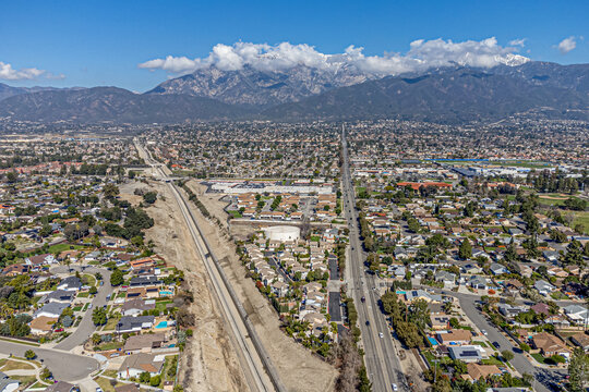 Rancho Cucamonga, San Bernardino County, CA, California, February, 22, 2024: Aerial Drone City View toward Carnelian St and Base Line Rd with Cucamonga Creek Trail,  Red Hill Park, Homes, Houses

