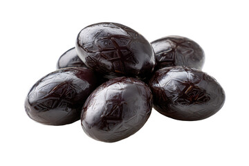 Dark, glossy, oval-shaped olives clustered together, exhibiting intricate, carved designs