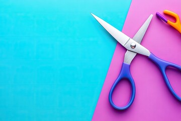 Purple and blue handled scissors lie on a split turquoise and pink background, accompanied by a smaller orange tool, possibly a thread cutter