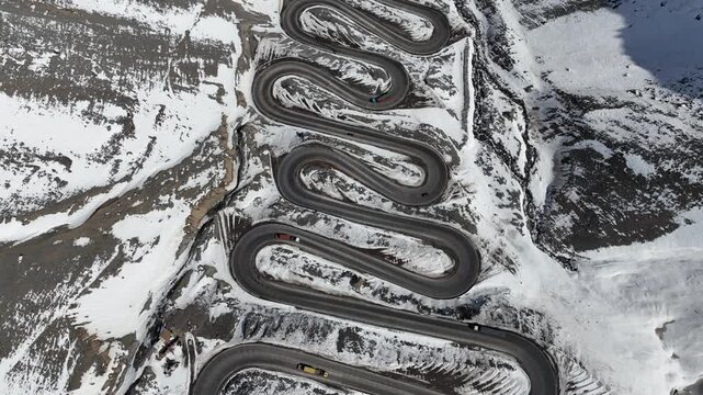 Los Caracoles highway road near Santiago Chile in aerial view. Snow highway road.