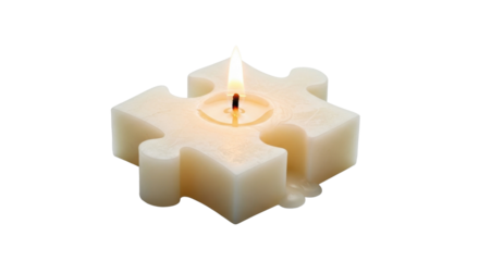 A single, lit candle shaped like a puzzle piece, against a white background.