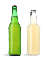 Different types of fresh beer in glass bottles isolated on white