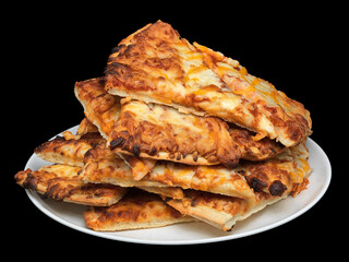 Stack of cheese pizza slices on a white plate against black background