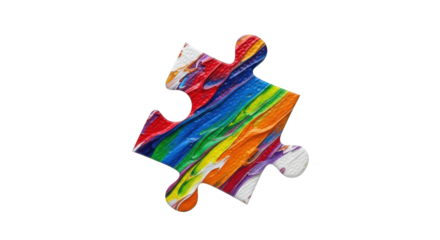 Colorful puzzle piece with vibrant paint strokes, isolated on white background.