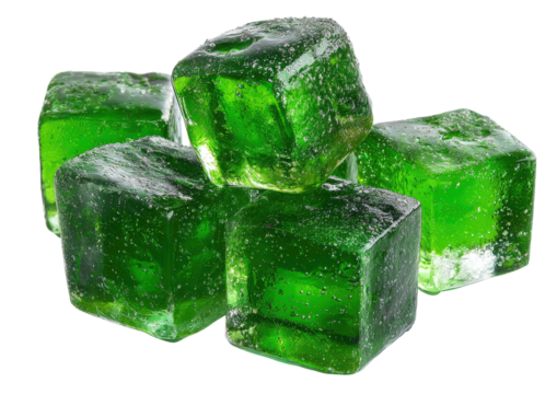 Pile of vibrant green, square, glassy candies