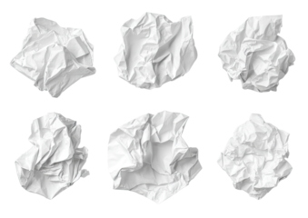 Crumpled white paper balls.  Nine crumpled pieces of white paper, isolated on black background, various shapes and textures