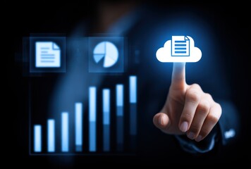 A hand interacts with floating blue data visualizations, including a cloud storage symbol, charts, and document icons, against a dark, blurred backdrop