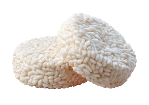 Two light beige, round, puffed rice cakes, stacked