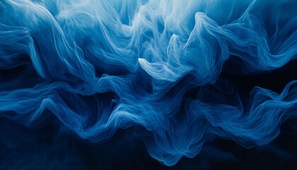 The image shows an abstract representation of blue fabric with a wave-like pattern, captured against a dark background.