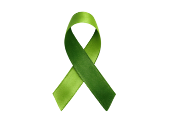 Bright lime-green awareness ribbon, satin finish, isolated on black background