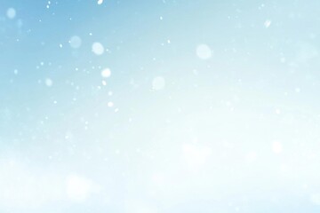 Fototapeta premium Gentle Snowflakes falling on a Pale Blue Sky Background and Festive Theme