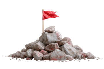 A small, red flag atop a pile of gray rocks