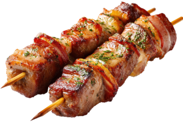 Two grilled pork skewers, seasoned and topped with bacon and cheese.  Appetizing, browned meat chunks alternate with strips of bacon and melted cheese.  Fresh herbs garnish
